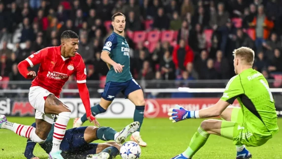 Arsenal ride their luck to get draw at PSV in dead-rubber Champions League tie