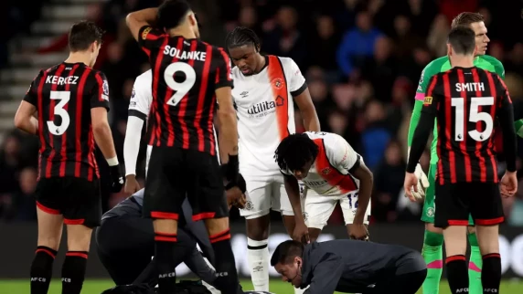 Luton clash with Bournemouth abandoned after Tom Lockyer suffers cardiac arrest