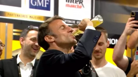 French President Macron downs a beer while celebrating with Toulouse