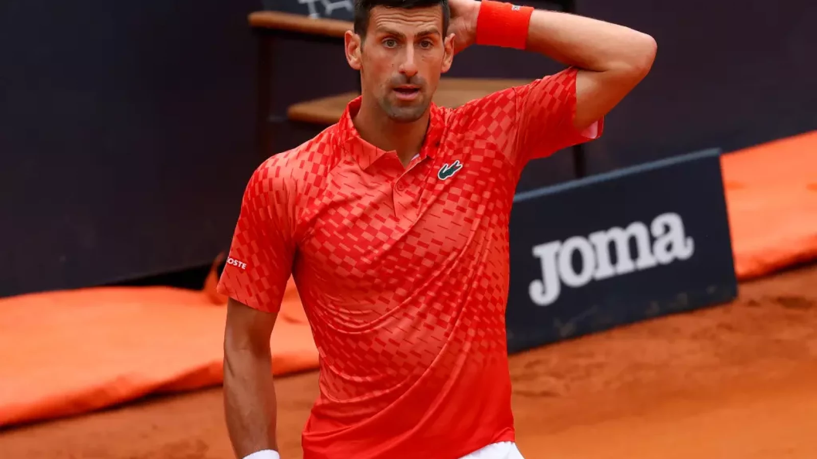 Serbia's Novak Djokovic shouts during the quarter final match against  Denmark's Holger Rune at the Italian Open tennis tournament, in Rome,  Wednesday, May 17, 2023. (AP Photo/Gregorio Borgia Stock Photo - Alamy