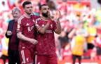 Andy-Robertson-and-Mohamed-Salah-applaud-Liverpool-fans---Alamy-202616.webp