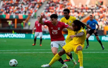 Ahmed Mostafa Mohamed Sayed of Egypt and Edmilson Gabriel Dove of Mozambique during the TotalEnergies CAF Africa Cup of Nations group stage match between Egypt and Mozambique at on January 14