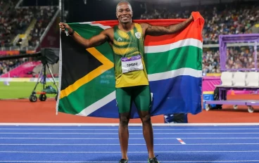 Akani Simbine (silver medallist in the mens 100m final) with his South African flag during the evening session of Athletics on day 6 of the 2022 Commonwealth Games at Alexander Stadium on Aug