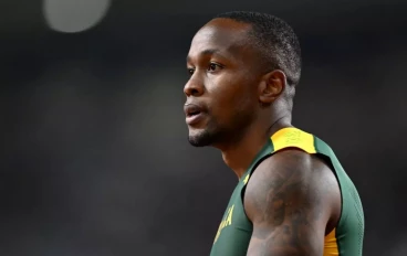 Akani Simbine of Team South Africa looks on during heat 7 of the Men's 100m during day one of the World Athletics Championships Budapest 2023 at National Athletics Centre on August 19, 2023 i