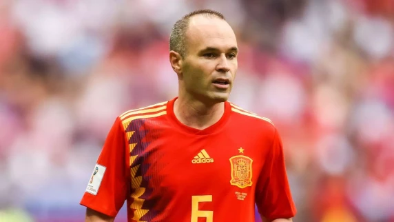 Spain and Barcelona star Andres Iniesta hangs up his boots