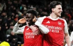 arsenal-s-bukayo-saka-(left)-celebrates-with-declan-rice-18-february-202616.webp