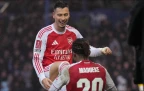 arsenal-s-gabriel-martinelli-and-noni-madueke-celebrate-after-goal-11-january-202616.webp