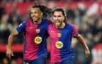 barcelona-s-eric-garcia-celebrates-with-jules-kounde16.webp