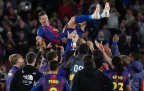barcelona-s-robert-lewandowski-is-thrown-into-the-air-by-his-teammates-17-may-202616.webp