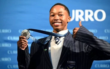 Bayanda Walaza (18) matric student is presented with his Olympic silver medal at Curro Hazeldean on August 15, 2024 in Pretoria, South Africa. Bayanda Walaza won a silver medal in the 4x 100m