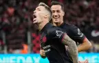 bayer-leverkusen-s-alex-grimaldo-celebrates-after-he-scored-12-september-202516.webp