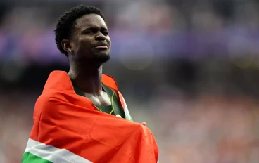 Bradley Nkoana of Team South Africa celebrates his team's silver medal finish in the Men's 4 x 100m Relay Final on day fourteen of the Olympic Games Paris 2024 at Stade de France on August 09