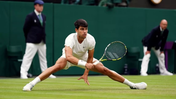 Wimbledon: Carlos Alcaraz taken to five sets but eventually sees off Frances Tiafoe