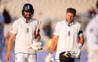 chris-woakes-(left)-and-joe-root-for-england-aug-202416.webp