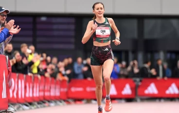 Cian Oldknow of South Africa crosses the finish line in the Women's 10km race during the Adizero Road To Records 2023 on April 29, 2023 in Herzogenaurach, Germany