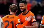 cody-gakpo-of-netherlands-celebrates-with-frenkie-de-jong-after-scoring-12-october-202516.webp