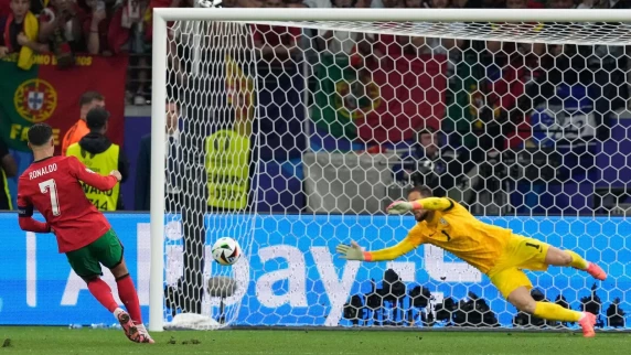 Portugal goalkeeper saves three in penalty shootout win over Slovenia