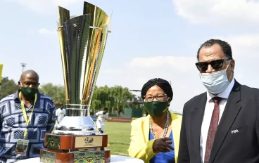 SAFA president Danny Jordaan with ABC Motsepe League national trophy
