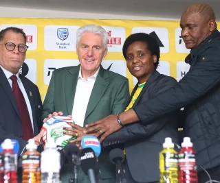 Danny Jordaan and SAFA executives with Hugo Broos