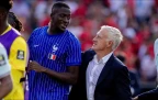 didier-deschamps-and-ibrahima-konate-of-france-9-july-202616.webp