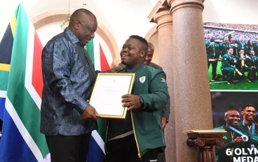 President Ramaphosa and Donald Ramphadi dancing at the recognition of excellence ceemony for the 2024 Olympians and Paralympians at Union Buildings on November 29, 2024 in Pretoria, South Afr