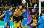 dortmund-s-nico-schlotterbeck-and-serhou-guirassy-jump-for-the-ball-1-february-202616.webp