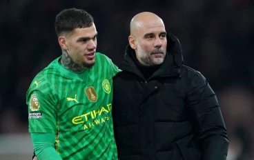 Ederson and Pep Guardiola