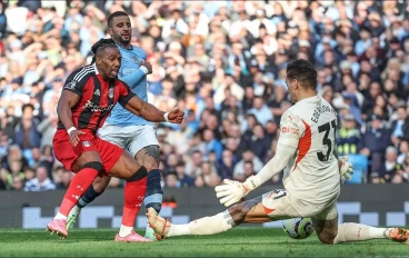 ederson-of-manchester-city-saves-a-shot-from-adama-traore16