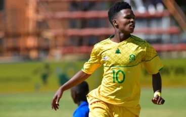 Emile Witbooi of South Africa beats the defense and goalkeeper and score during the U17 International Friendly match between South Africa and Lesotho at UJ Soweto Stadium on August 18, 2024 i