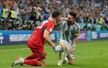 Emiliano Martinez and Lionel Messi