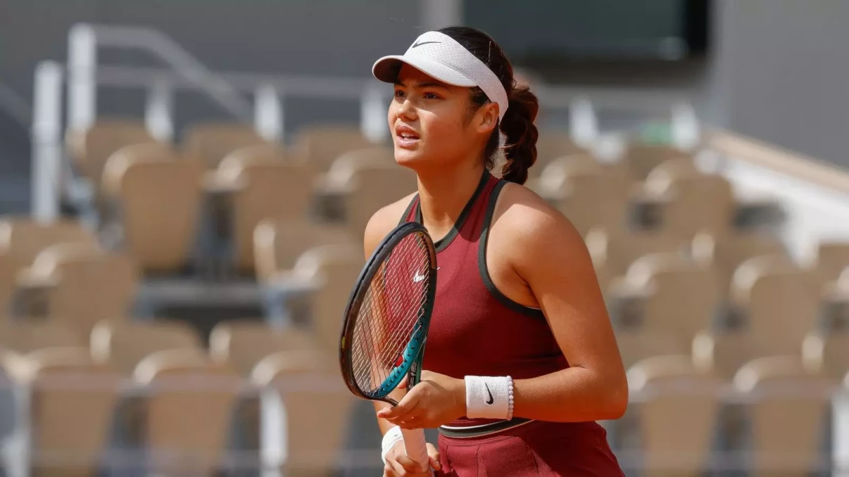 Emma Raducanu's French Open hopes ended by defending champion Iga Swiatek