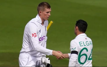 England's Zak Crawley shakes hands with South Africa captain Dean Elgar