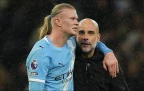 erling-haaland-and-manchester-city-manager-pep-guardiola-21-february-202616.webp