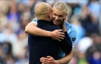 erling-haaland-of-manchester-city-celebrates-with-pep-guardiola-19-april-202616.webp