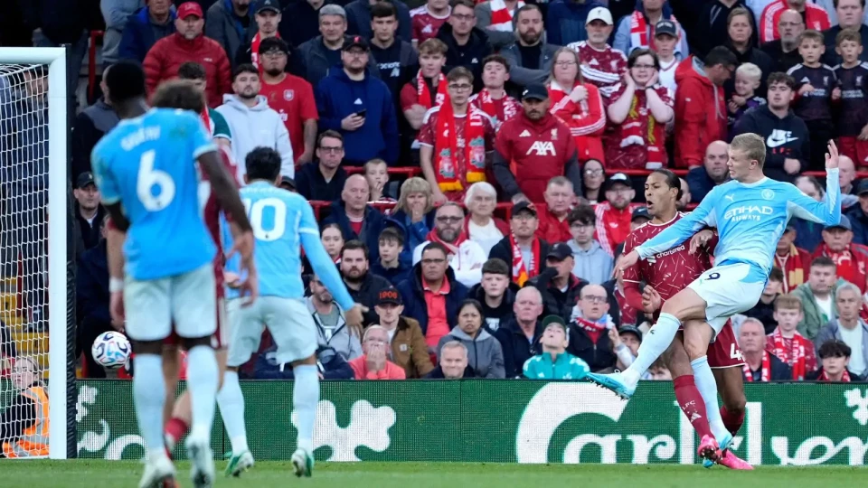 Man City silence Anfield with emphatic win over 10-man Liverpool