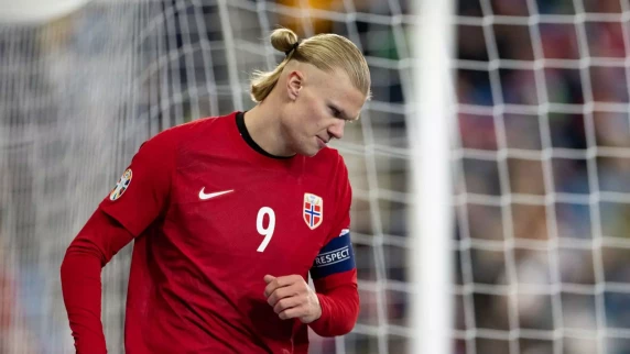 Man City's Erling Haaland limps out of training while on duty with Norway