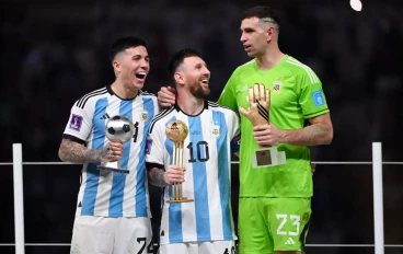 Enzo Fernandez, Lionel Messi and Emi Martinez with FIFA World Cup Awards