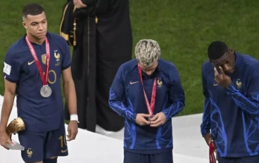 Kylian Mbappe(10) of France is seen with the Golden Boot award during a ceremony after the FIFA World Cup 2022 Final Match between Argentina and France