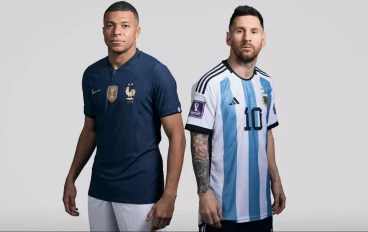 Kylian Mbappé of France with Lionel Messi of Argentina