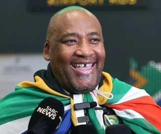 Gayton Mckenzie Minister of sports during the South African national men's soccer team arrival at OR Tambo International Airport on January 07, 2026 in Johannesburg, South Africa.