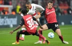 granit-xhaka-of-leverkusen-battles-for-the-ball16.webp