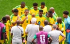 hugo-broos-with-bafana-bafana-players.webp