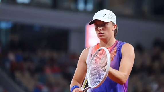 Iga Swiatek escapes match point after being taken to the brink by Naomi Osaka