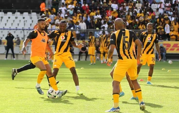 Kaizer Chiefs players warm-up at Cape Town Stadium