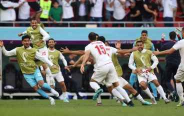 Iran celebrate wildly after scoring against Wales