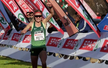 Irvette van Zyl crosses the finish line during the Tshwane SPAR Women's 10km race at the Irene Research Centre on August 06, 2022 in Pretoria, South Africa.