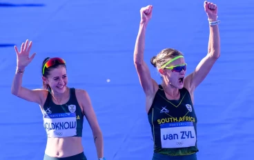 Irvette van Zyl and Cian OLDKNOW of South Africa in action during the WomenÕs Marathon on day 16 of the 2024 Paris Olympic Games at Invalides, Paris,France on August 11, 2024 in Paris, France