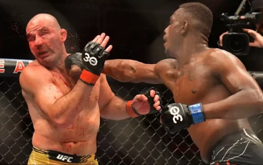 Jamahal Hill punches Glover Teixeira UFC 283