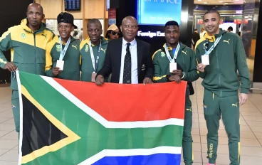Athletics South Africa president James Moloi and Team SA road runners