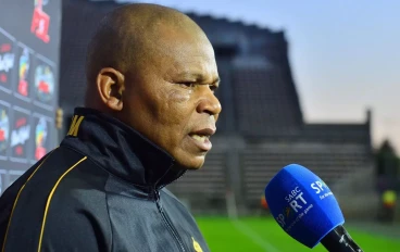 John Maduka (Head Coach) of Royal AM being interviewed during the Carling Knockout, Last 16 match between Cape Town City FC and Royal AM at Athlone Stadium on October 19, 2024 in Cape Town, S